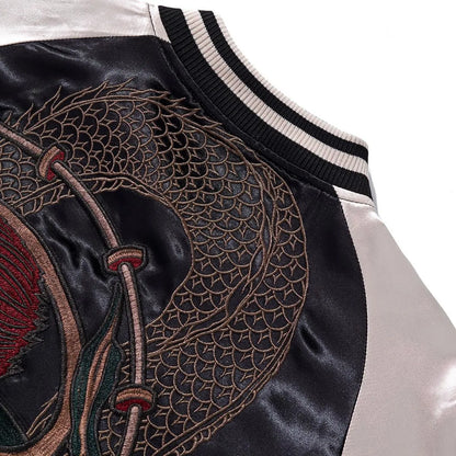 Detailed view of the heavy embroidery stitching showing texture and depth on the back design.