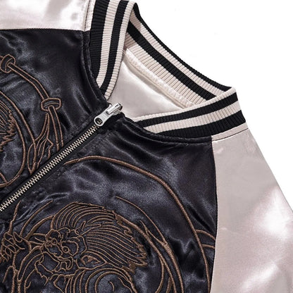 Detail shot showing the connection between the ribbed collar and the chest embroidery work.