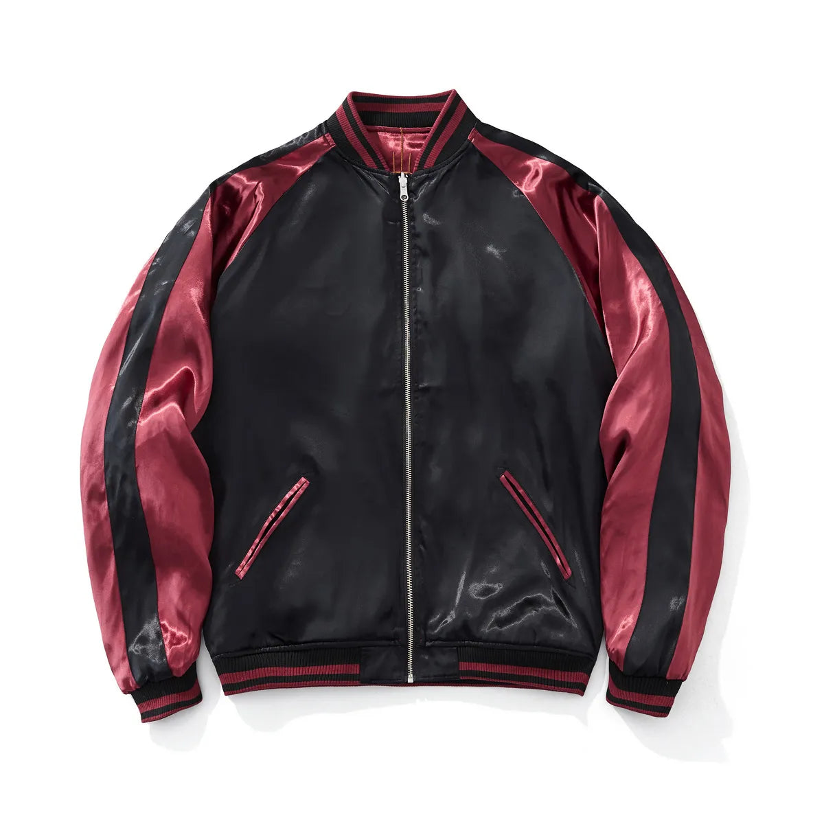 Front view of the reversible black side with red sleeve stripes and a clean, minimalist look.