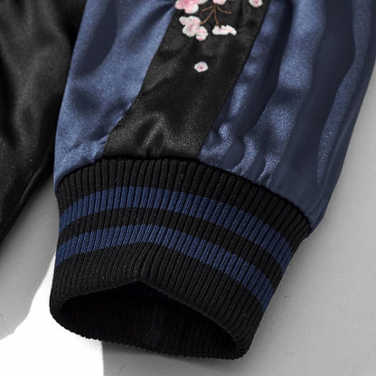 Reversible Kirin & Crescent Sukajan Jacket — ribbed cuff close-up with sakura embroidery on the sleeve panel.
