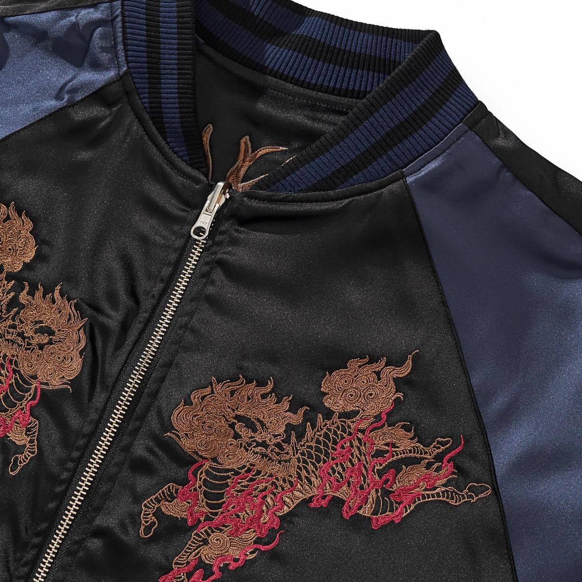 Front chest close-up of twin kirin embroidery with red flames, navy colorway.