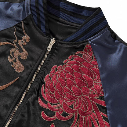 Ribbed collar and zipper close-up with bronze crescent and red chrysanthemum embroidery