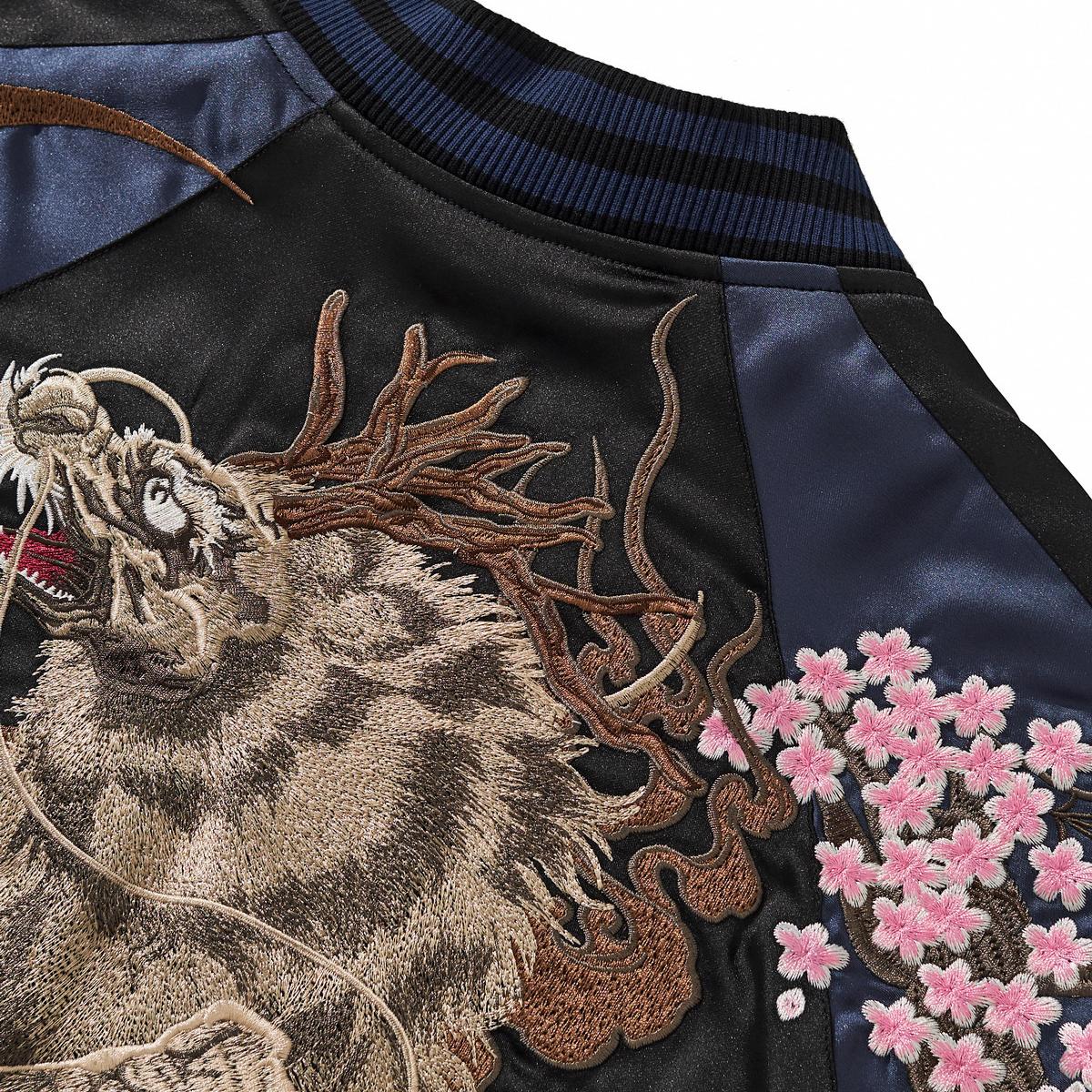 Navy shoulder close-up of kirin mane and antlers with sakura embroidery — Reversible Kirin & Crescent Sukajan Jacket