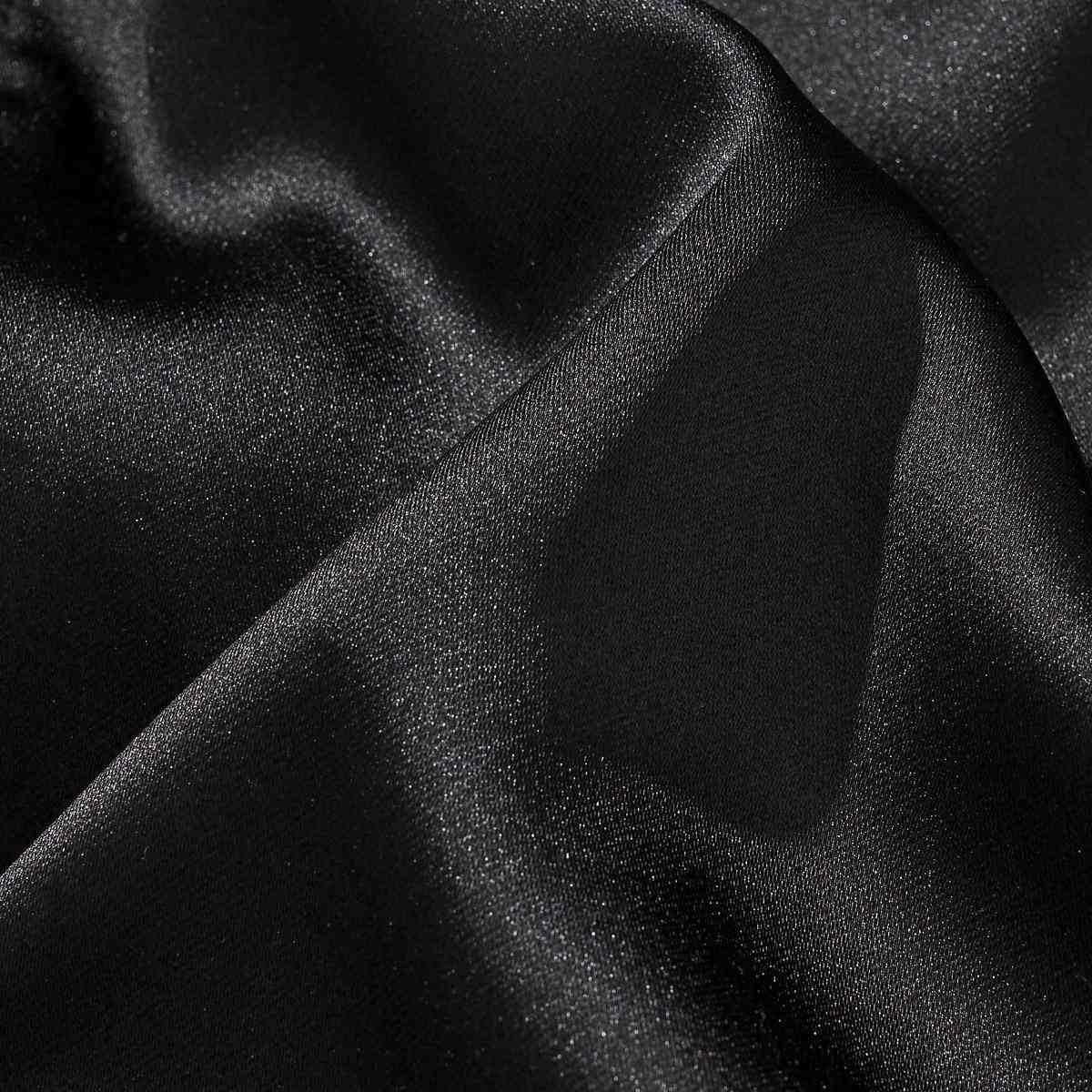 Satin fabric close-up of the reversible Lion & Sakura sukajan jacket, showing smooth, glossy weave texture.