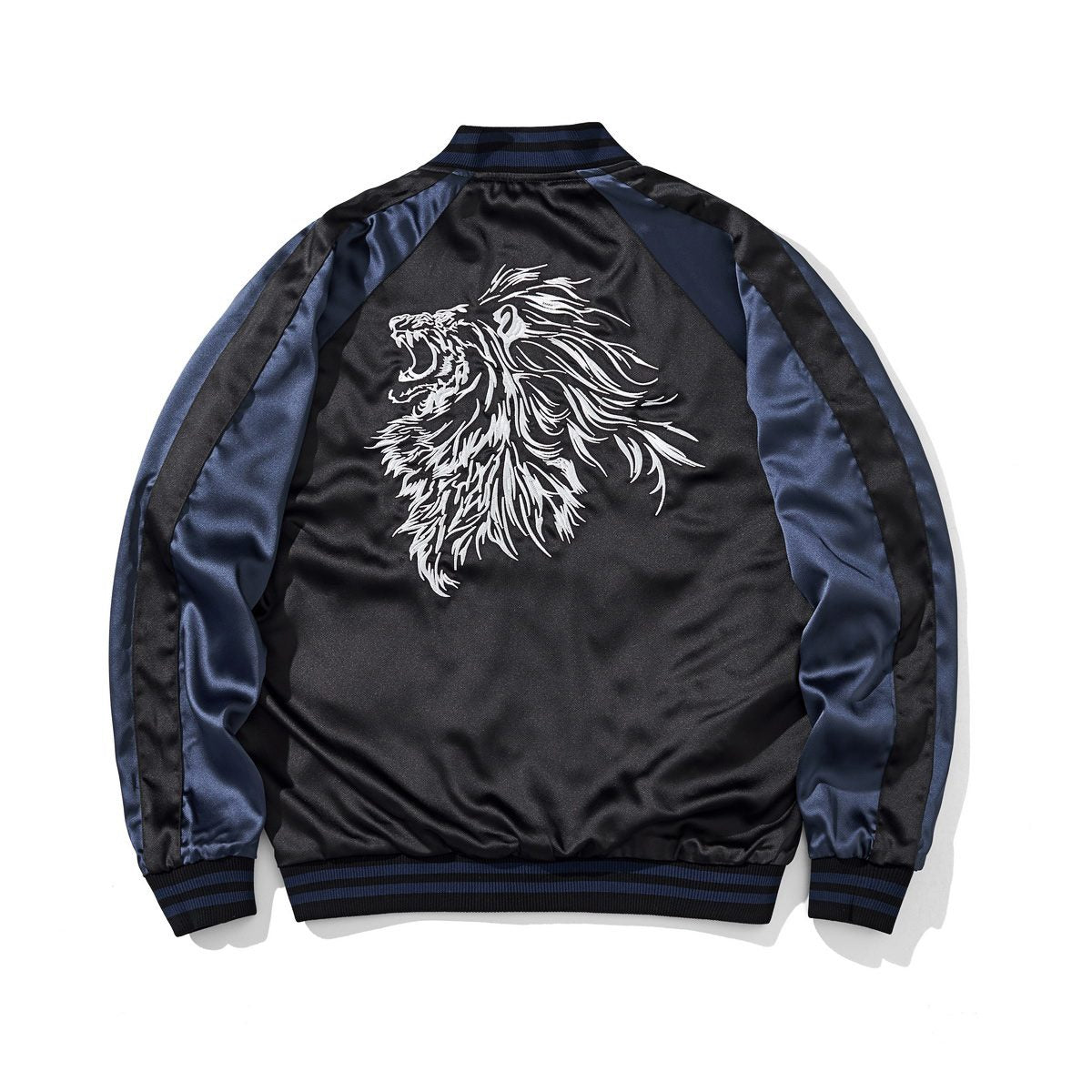 Side B back, navy color reversible sukajan jacket — graphic outline lion head embroidery at center back.