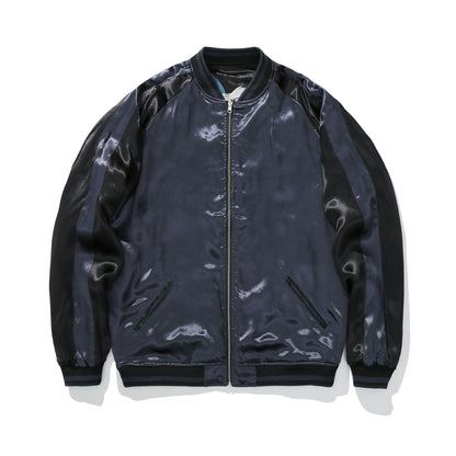 Reverse front—clean satin front with welt pockets and full-length zipper.