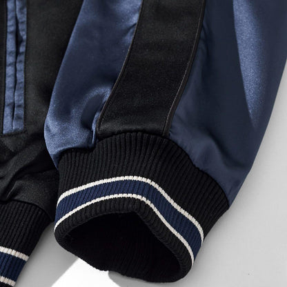 Ribbed cuff detail with navy-and-white stripe