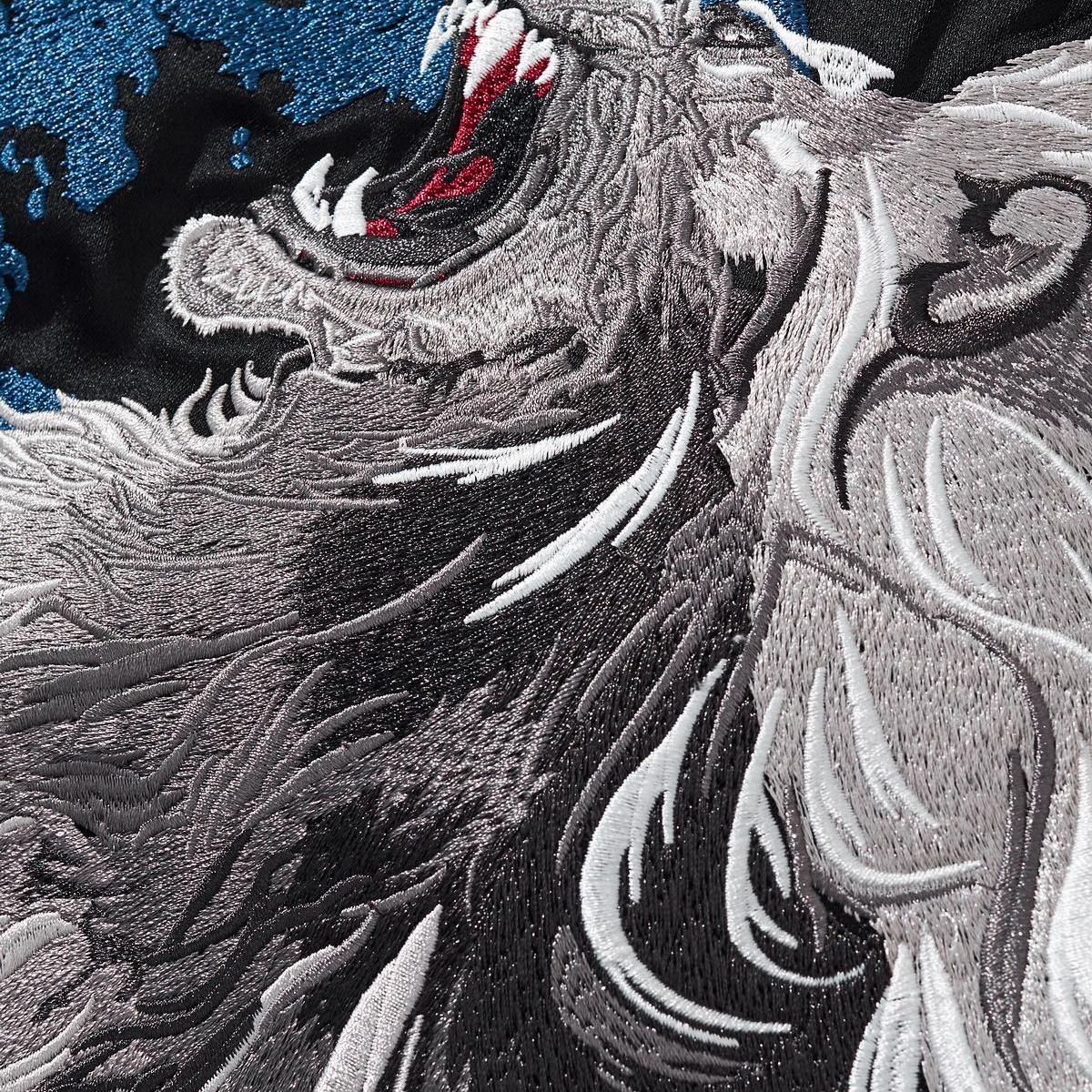 Macro of the lion’s mane and mouth stitching texture of sukajan jacket