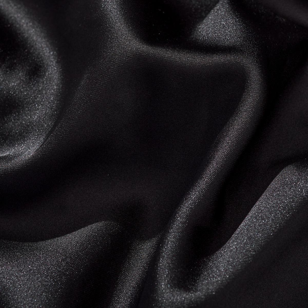 Smooth black satin fabric close-up showing soft drape and sheen