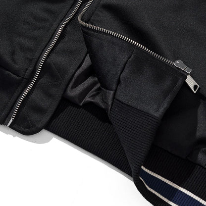 Hem detail with metal front zipper and rib knit waistband