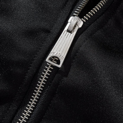 Close-up of the metal zipper pull and sturdy teeth