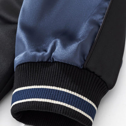 Rib cuff detail with contrast stripes