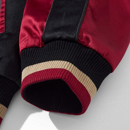 Ribbed cuff with striped trim detail on the sukajan jacket, close-up