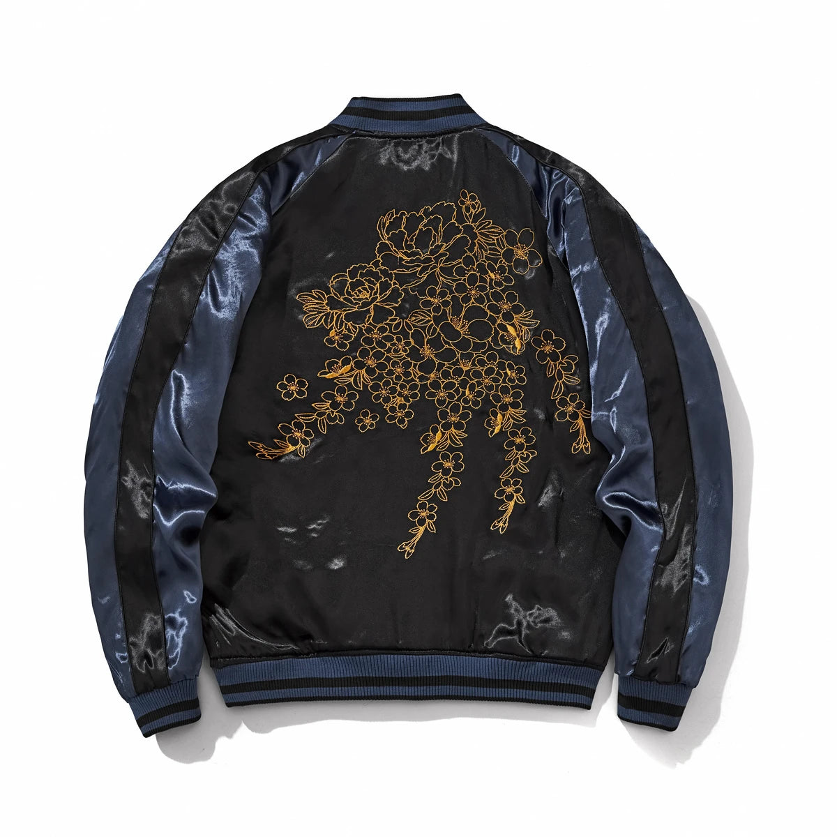 Back view of navy side Storm Dragons & Peony reversible sukajan with gold peony line embroidery.