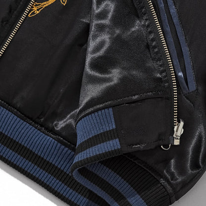 Detail of ribbed hem, zipper and pocket finish on navy side of Storm Dragons & Peony reversible sukajan.