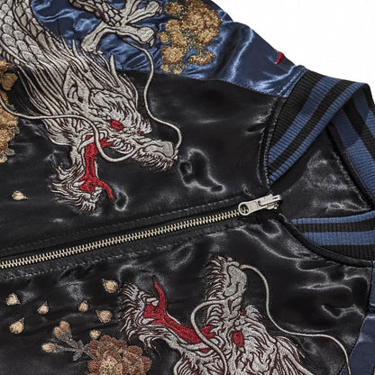 Close-up of twin storm dragon heads and chest zipper on navy Storm Dragons & Peony Japanese sukajan.