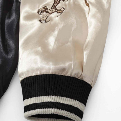 Close-up of striped ribbed cuff at sleeve opening.