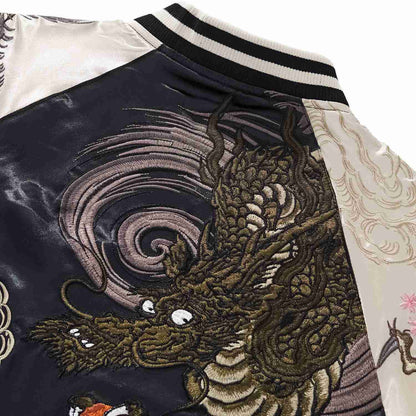 Macro detail of swirling clouds and dragon head embroidery on beige Twin Dragons & Sakura Japanese sukajan.