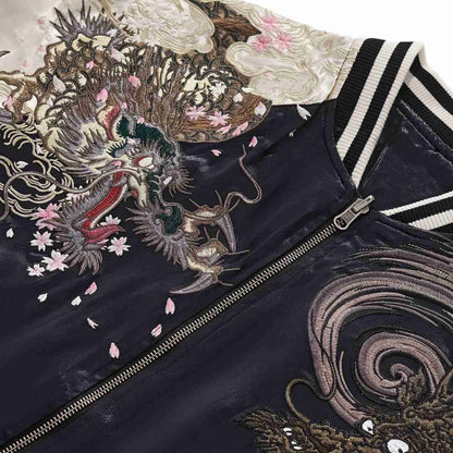 Close-up of fierce dragon face and sakura petal embroidery on Twin Dragons & Sakura Japanese sukajan jacket.