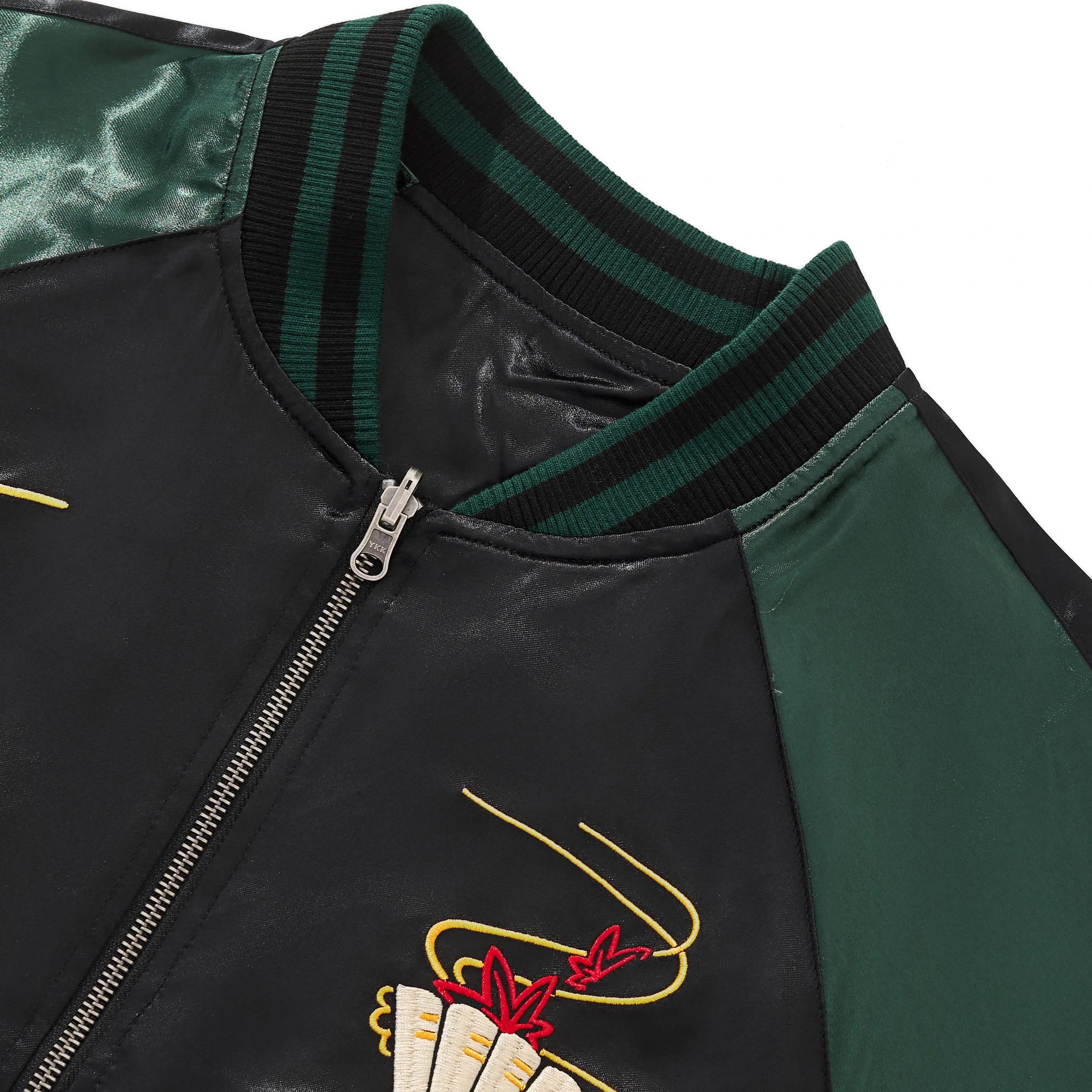 Vintage-style ribbed collar detail in green and black stripes.