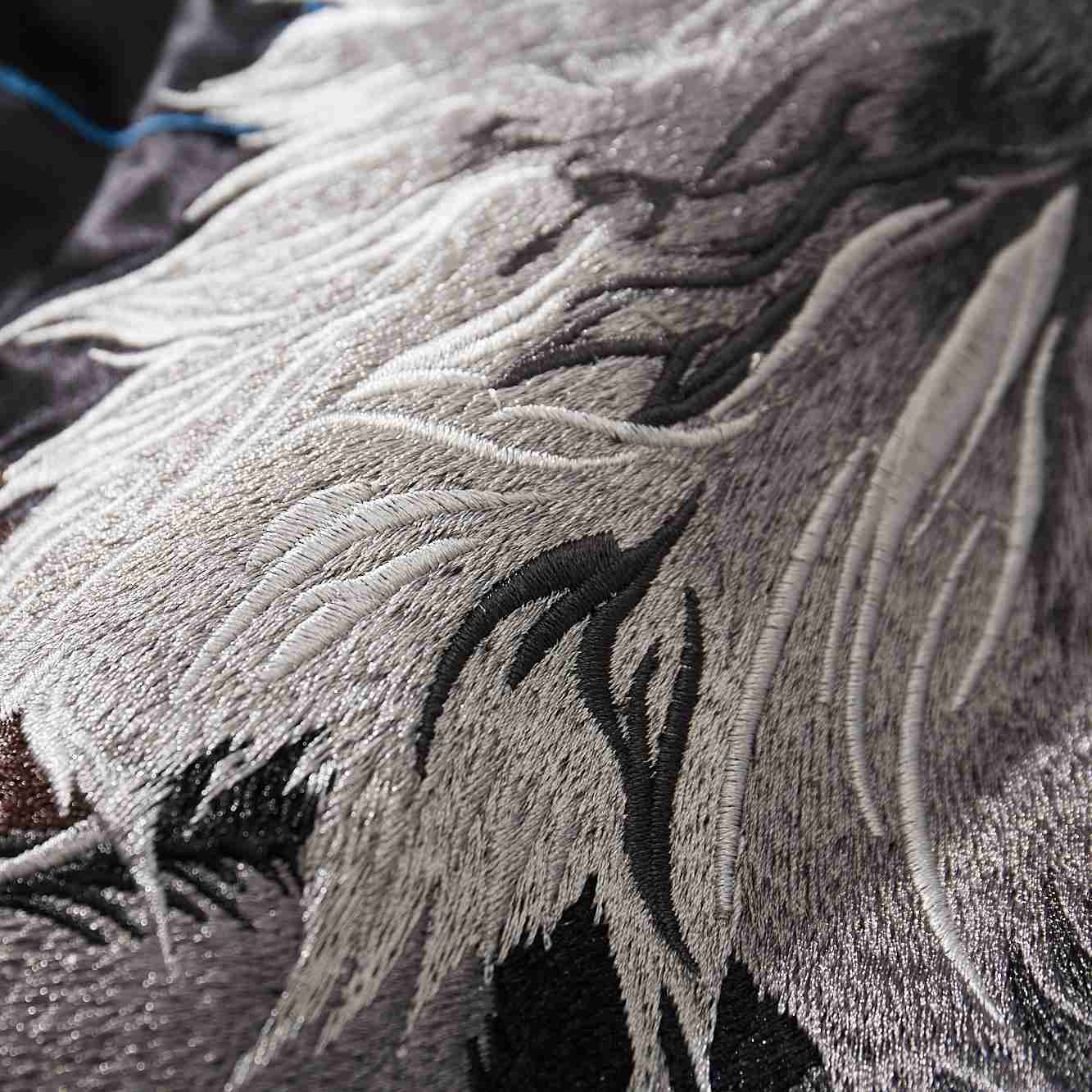 Layered thread gradients creating soft fur transitions.