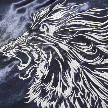 Embroidered roaring lion head outline with bold white threads.