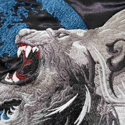 Roaring muzzle detail—teeth, tongue, and layered fur shading.