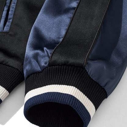 Ribbed cuff detail with navy-white stripe