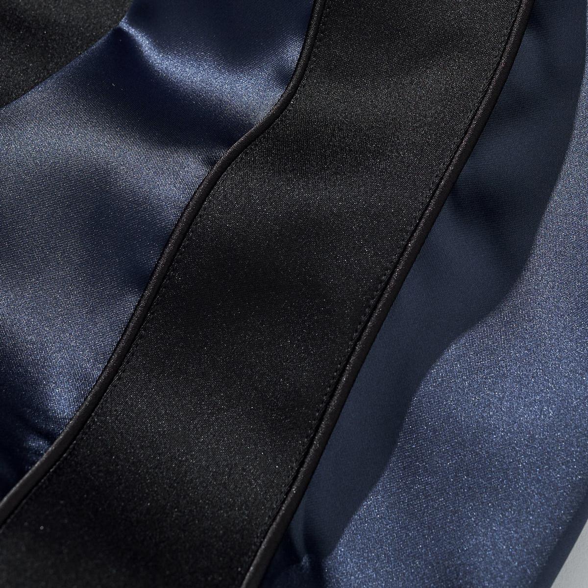 Satin sleeve panel detail with black side stripe