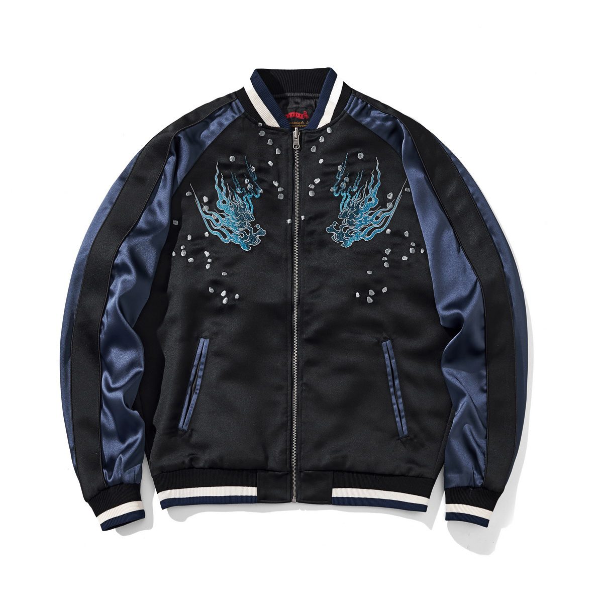 Front view with twin blue flame embroidery and scattered petals